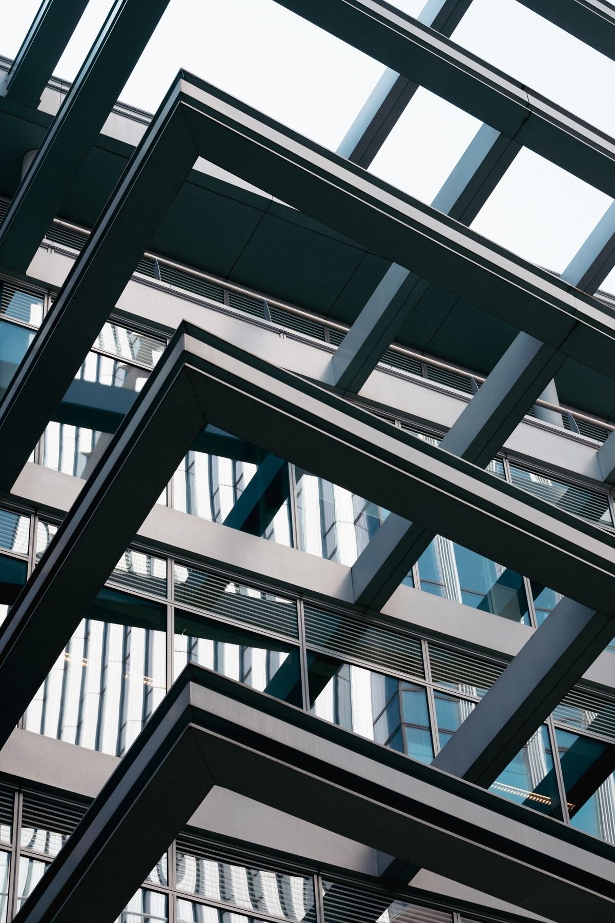 Steel and glass building facade seen from below