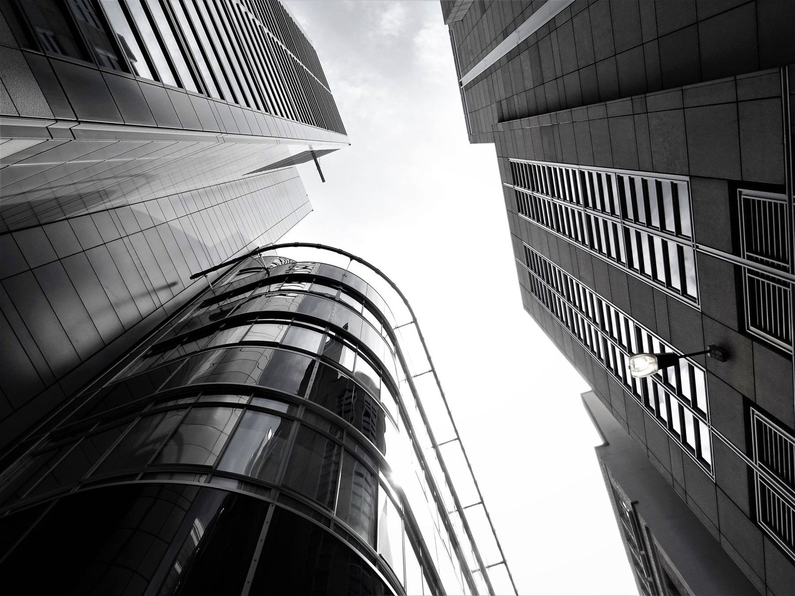 Glass office towers seen from street level